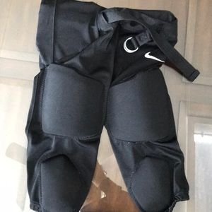Nike boys football pants with built in pads
